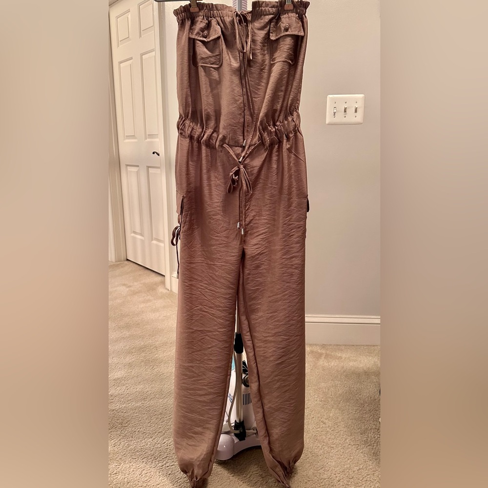 Lipstick Clothing, tan in color, strapless jumpsuit, Size Small.